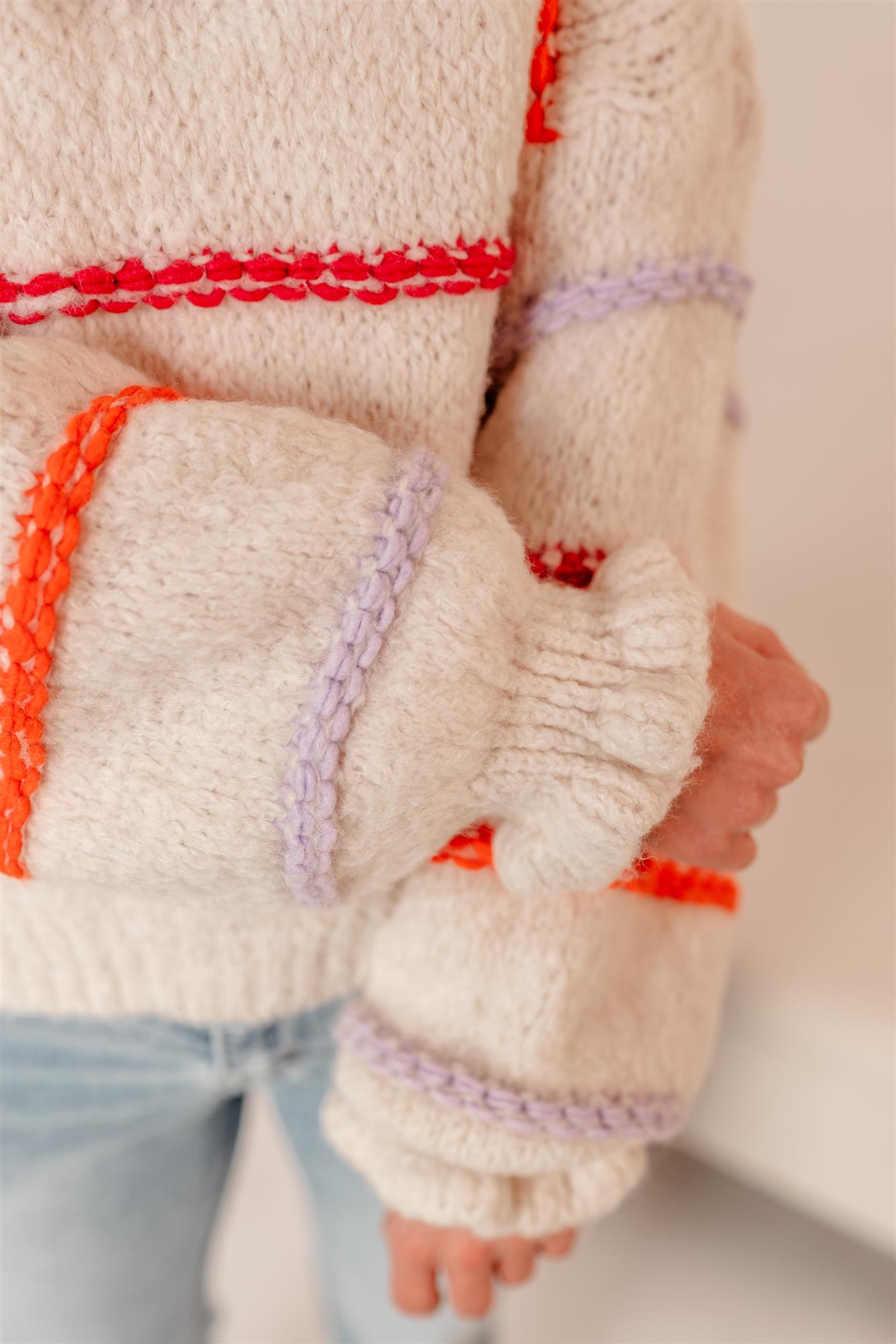 Pullover gestreift mit Volant Details