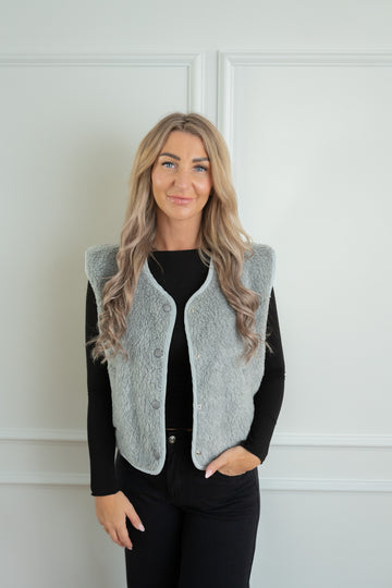 Weste mit Druckknöpfen