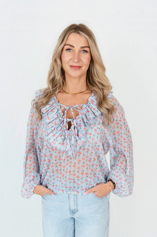 Bluse mit Rüschen und Schleife